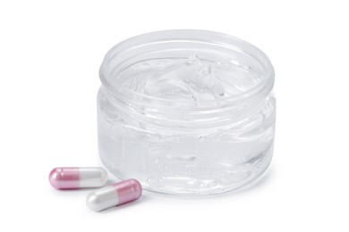 Photo of Jar of collagen gel and pills isolated on white