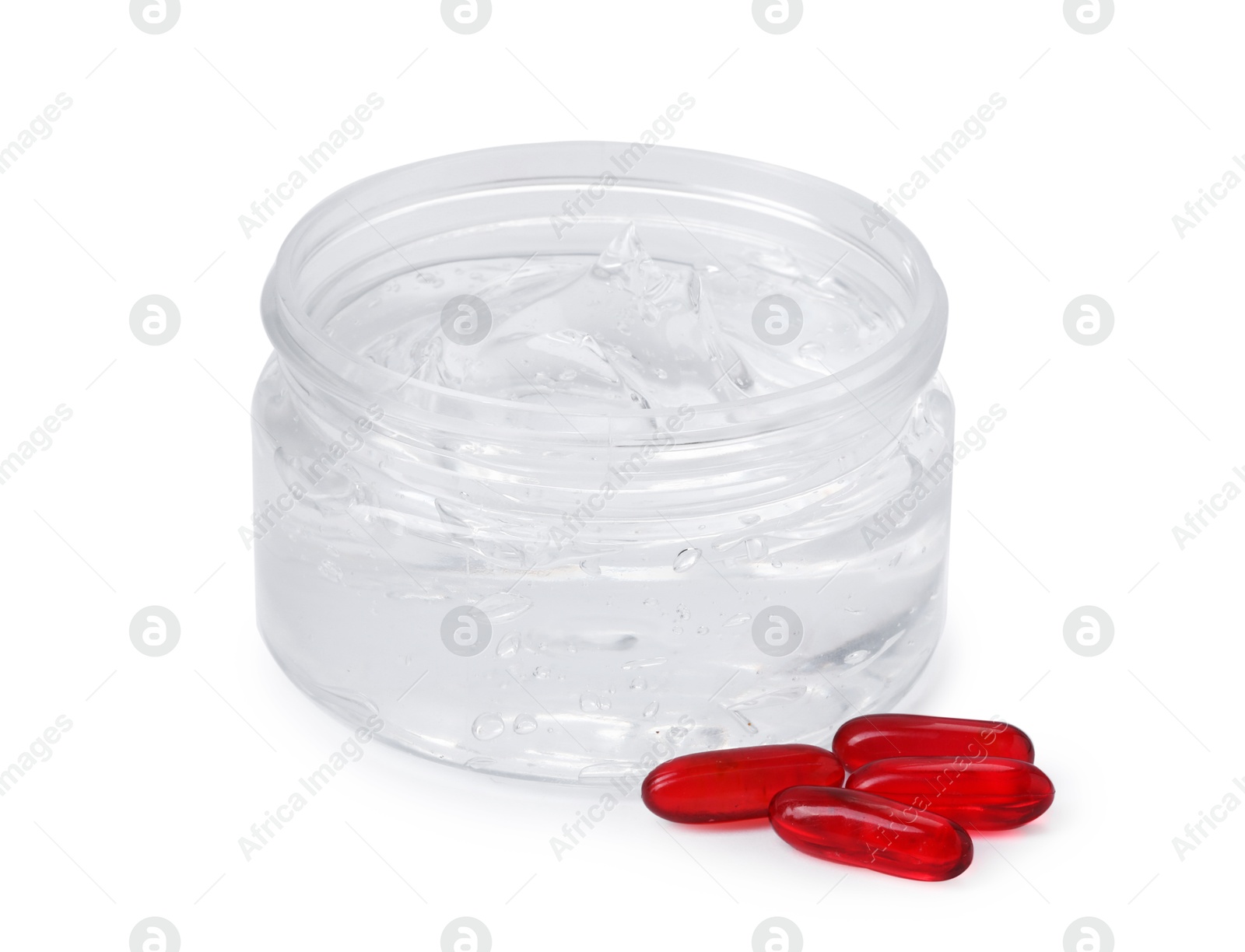 Jar of collagen gel and pills isolated on white Photo of Jar of collagen gel and pills isolated on white