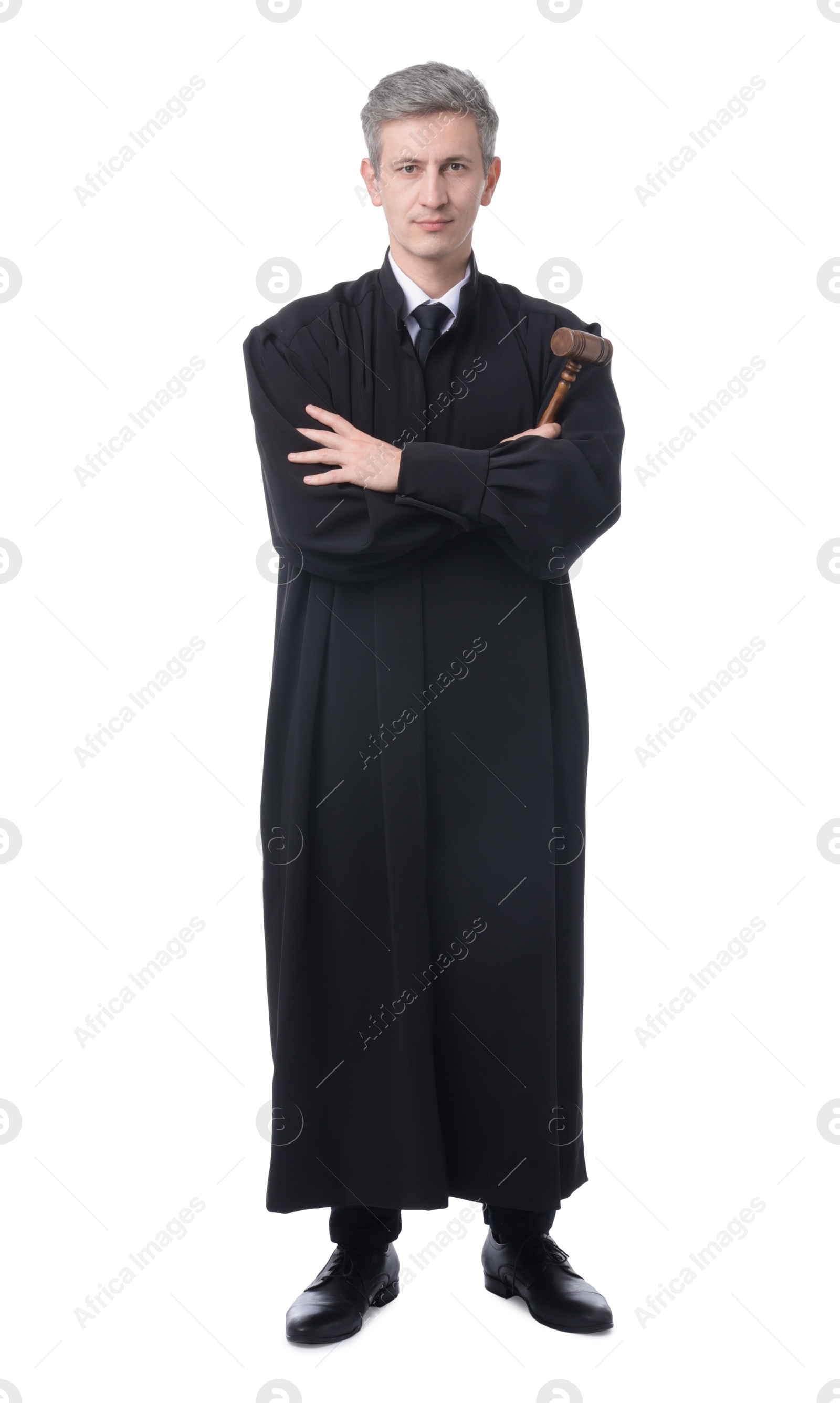 Judge with mallet in court dress on white background Photo of Judge with mallet in court dress on white background