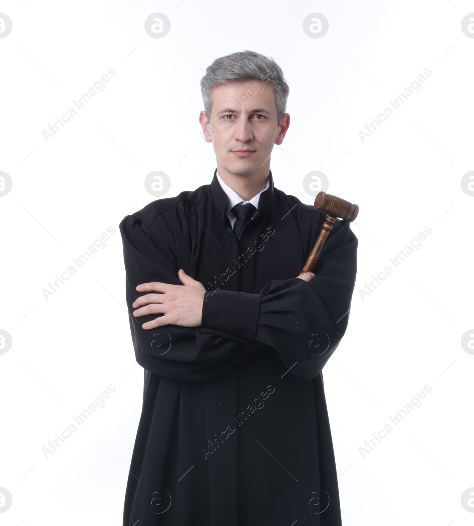 Judge with mallet in court dress on white background Photo of Judge with mallet in court dress on white background