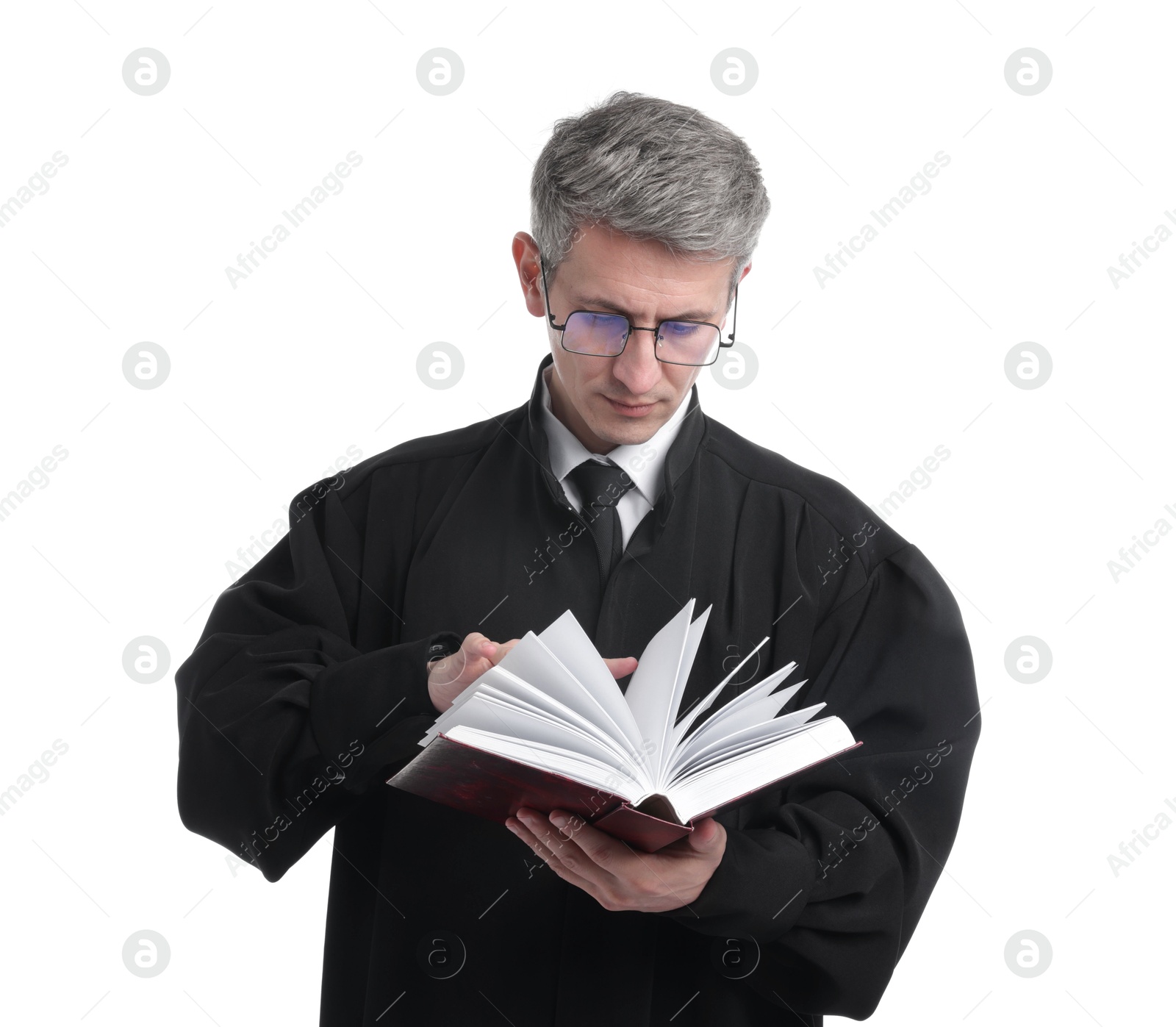 Judge in court dress with book on white background Photo of Judge in court dress with book on white background