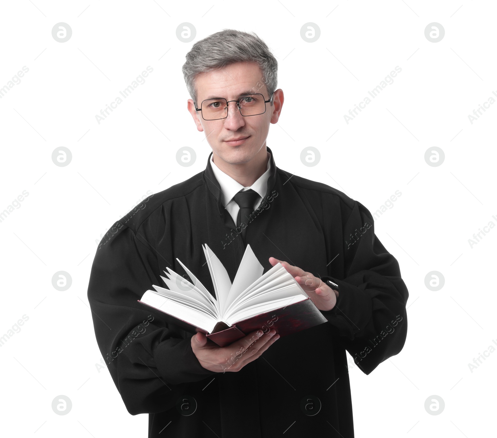 Judge in court dress with book on white background Photo of Judge in court dress with book on white background