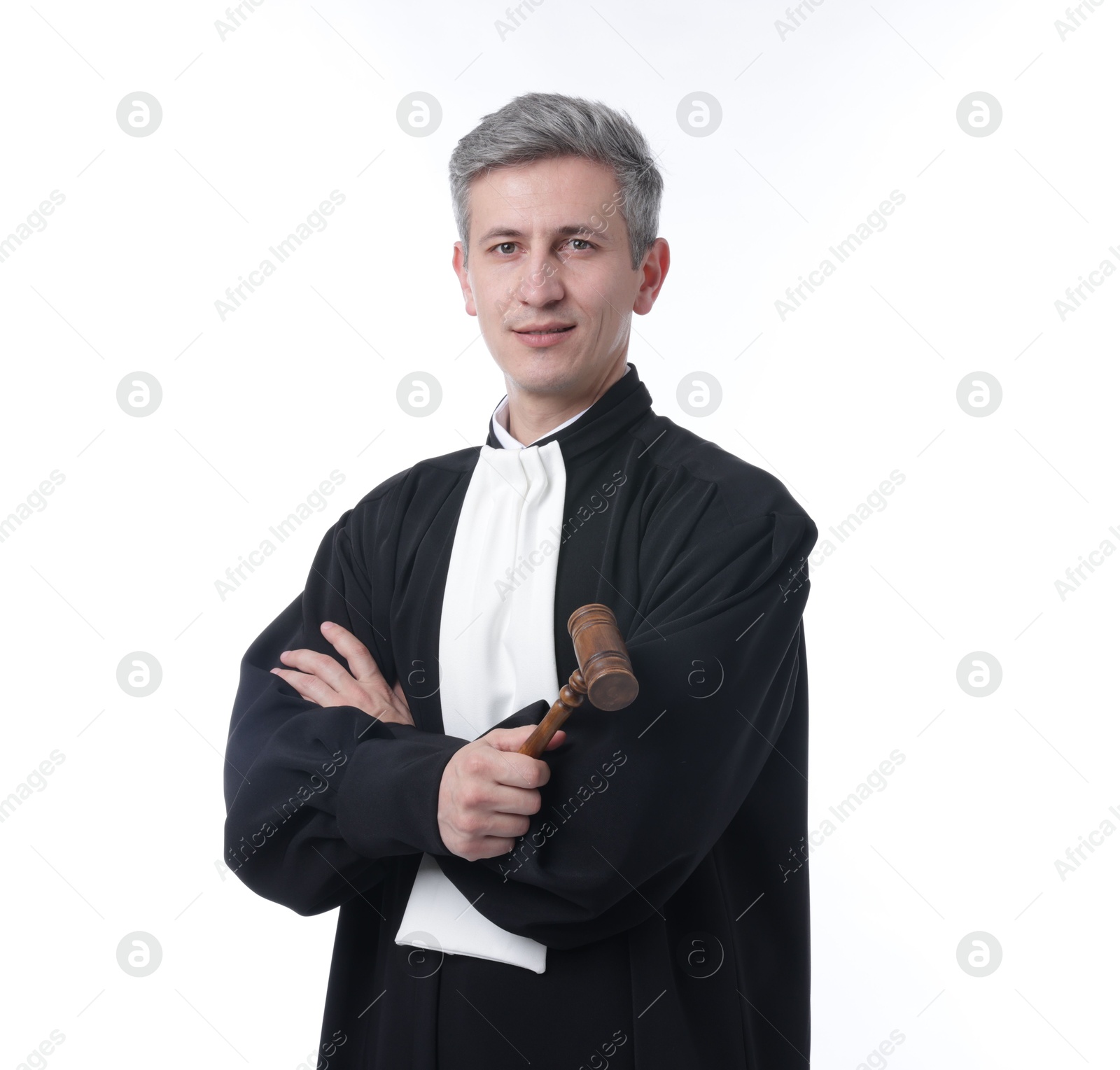 Judge with mallet in court dress on white background Photo of Judge with mallet in court dress on white background