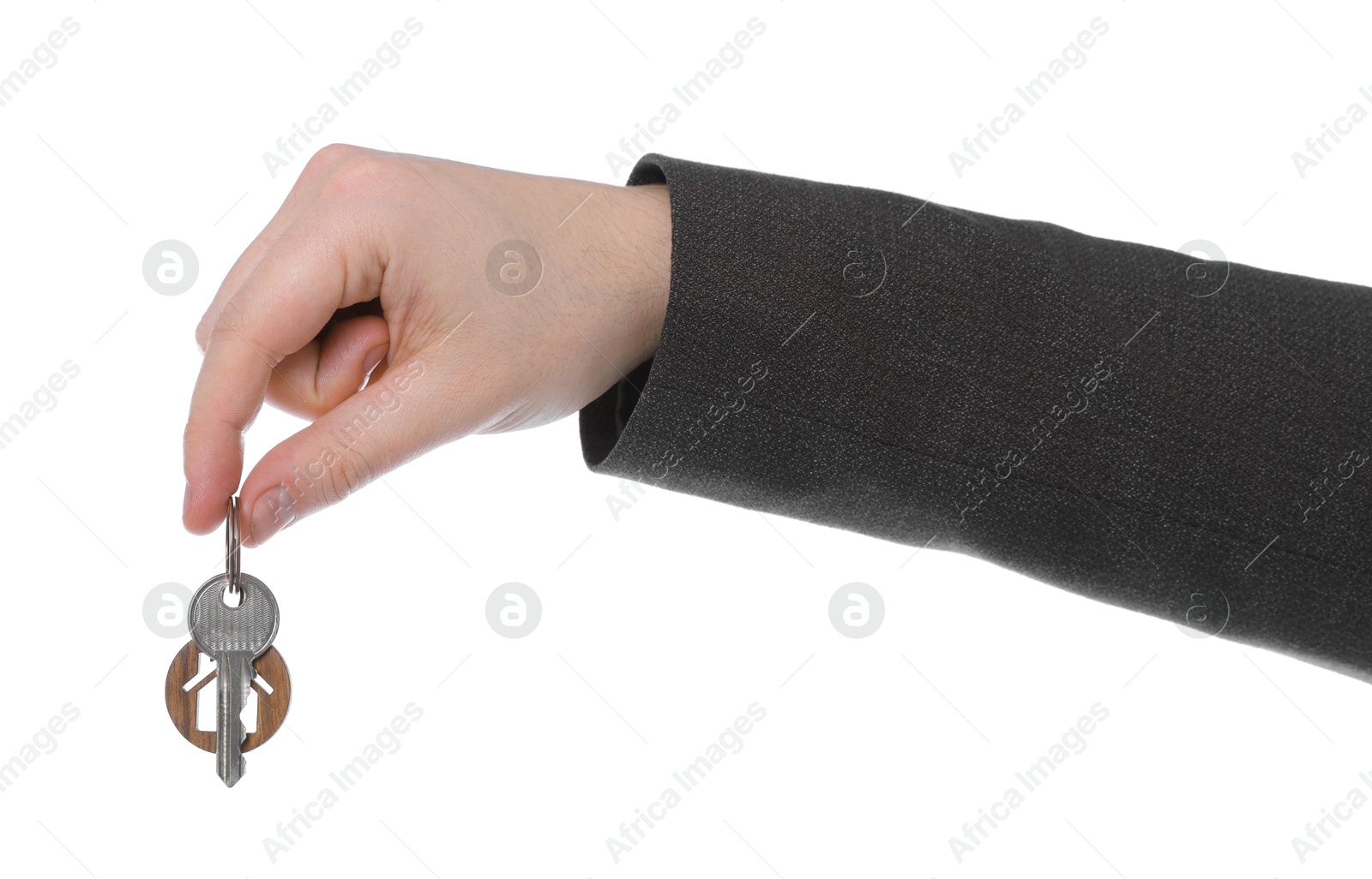 Real estate agent holding key with house shaped keychain on white background, closeup Photo of Real estate agent holding key with house shaped keychain on white background, closeup