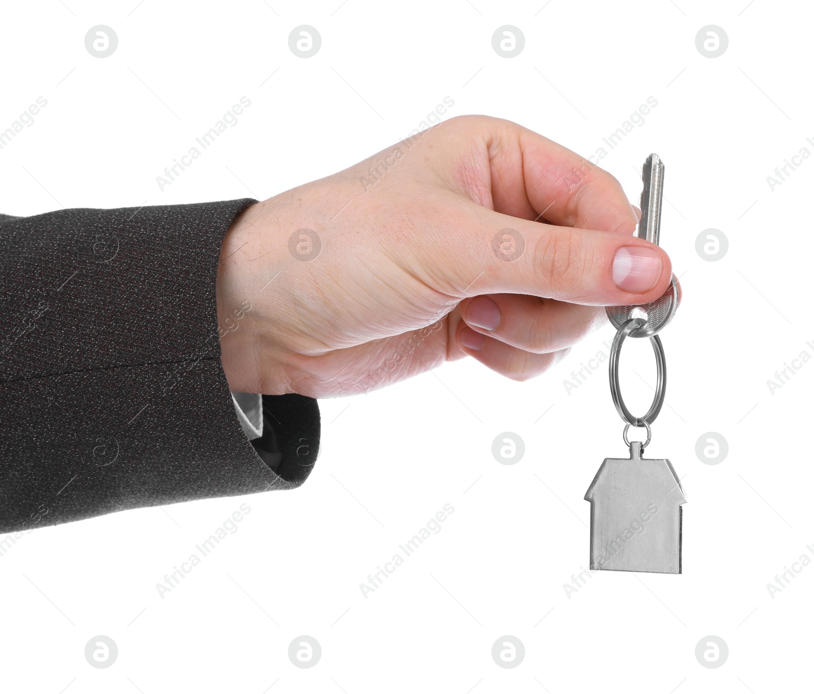 Real estate agent holding key with house shaped keychain on white background, closeup Photo of Real estate agent holding key with house shaped keychain on white background, closeup