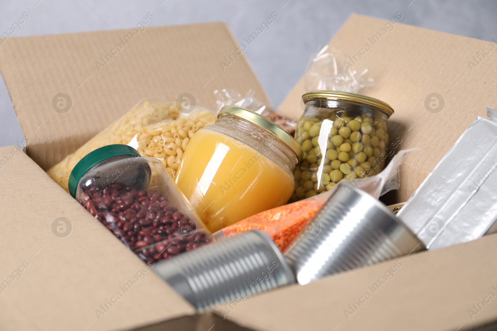 Many different food products in box, closeup Photo of Many different food products in box, closeup