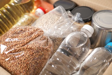 Photo of Many different food products in box, closeup