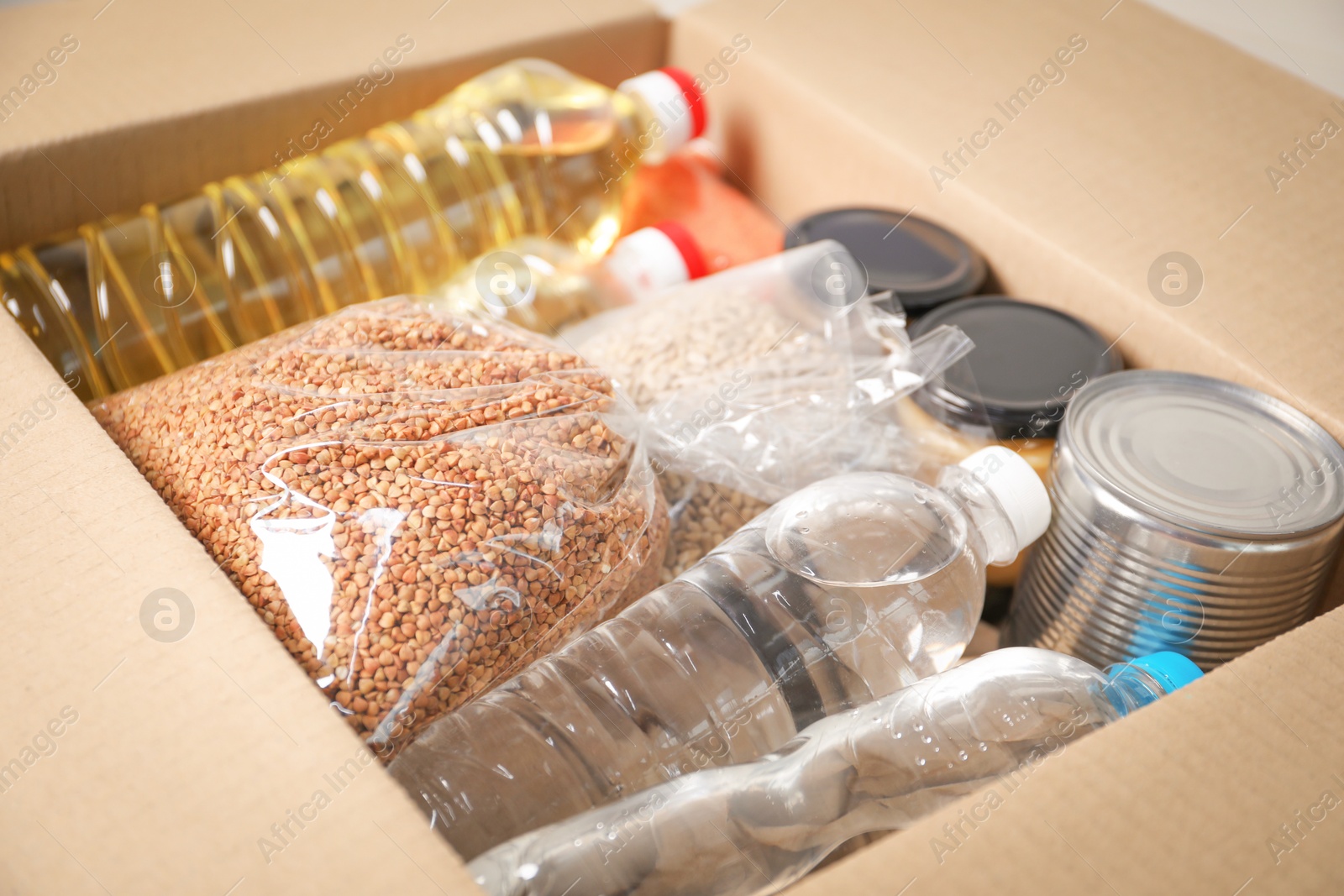 Many different food products in box, closeup Photo of Many different food products in box, closeup