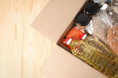 Photo of Different food products in box, top view