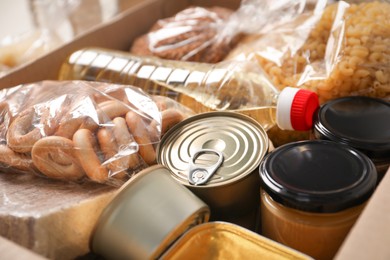 Photo of Many different food products in box, closeup
