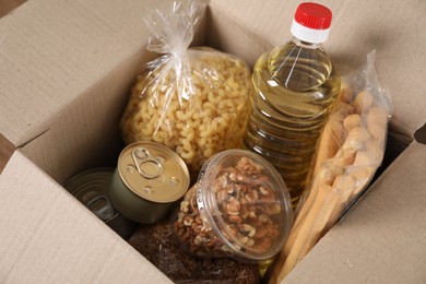 Photo of Many different food products in box, closeup