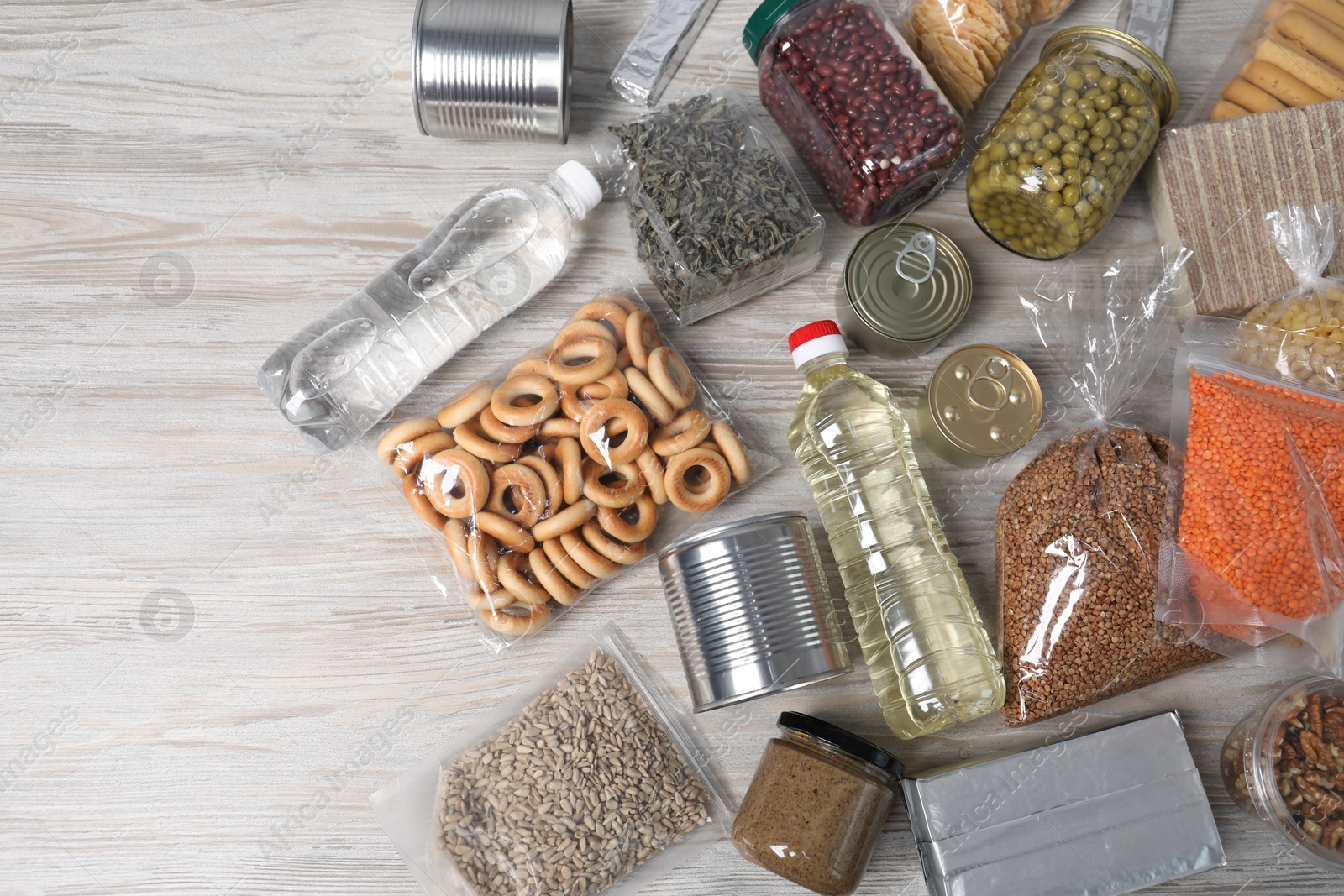 Different food products on wooden table, flat lay Photo of Different food products on wooden table, flat lay