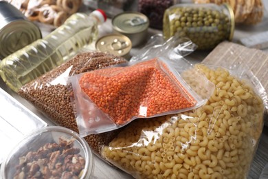 Photo of Many different food products on table, closeup