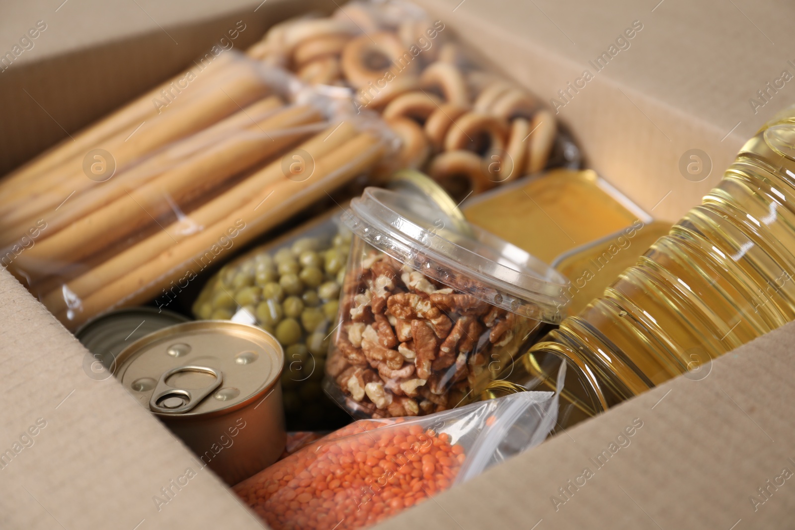Many different food products in box, closeup Photo of Many different food products in box, closeup