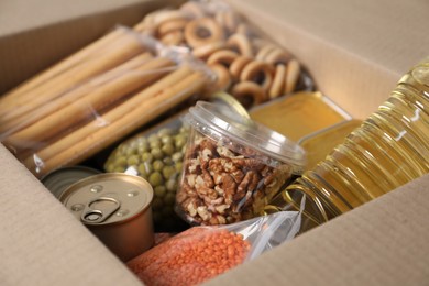 Photo of Many different food products in box, closeup