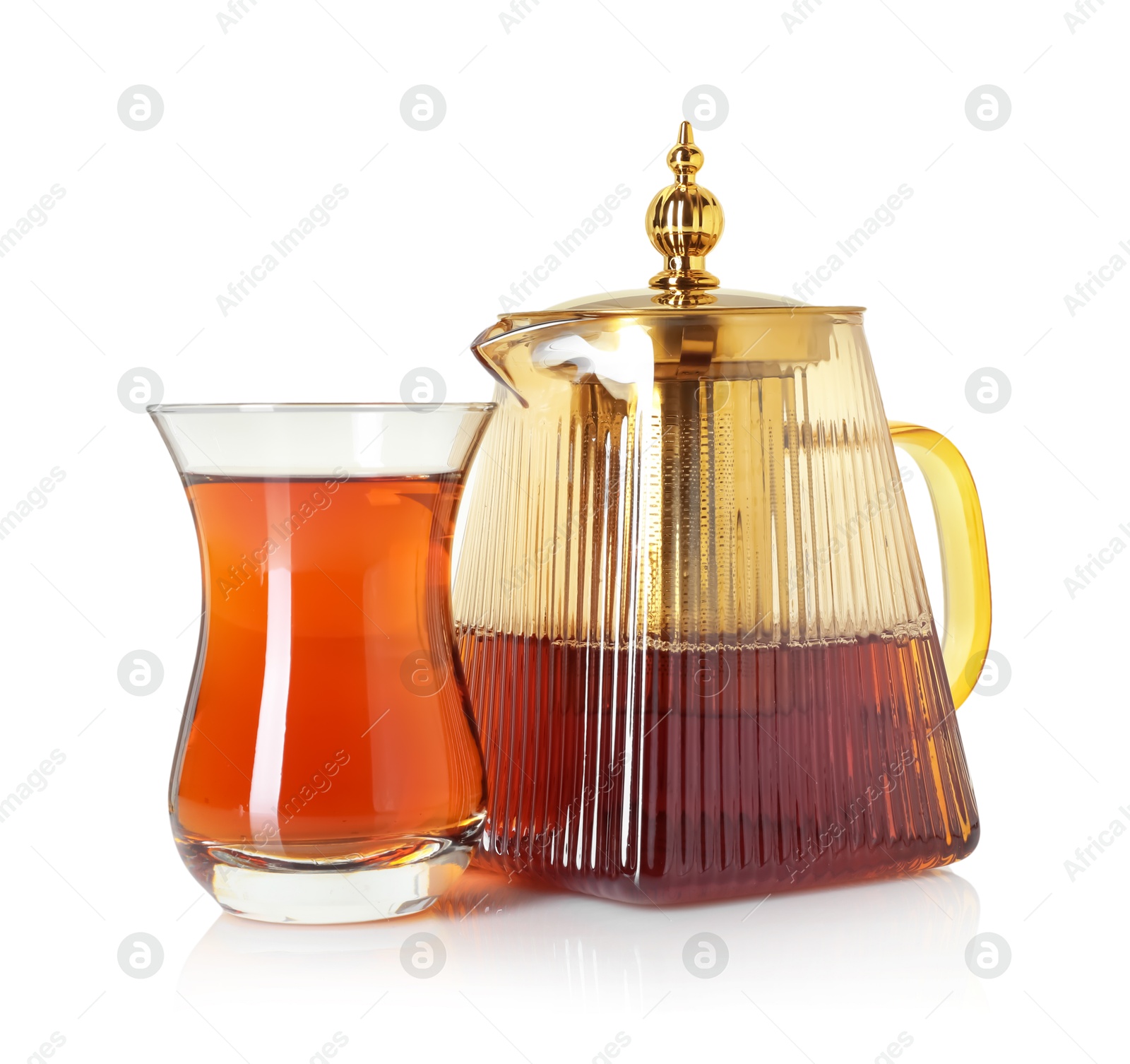 Tasty Turkish tea in cup and teapot isolated on white Photo of Tasty Turkish tea in cup and teapot isolated on white