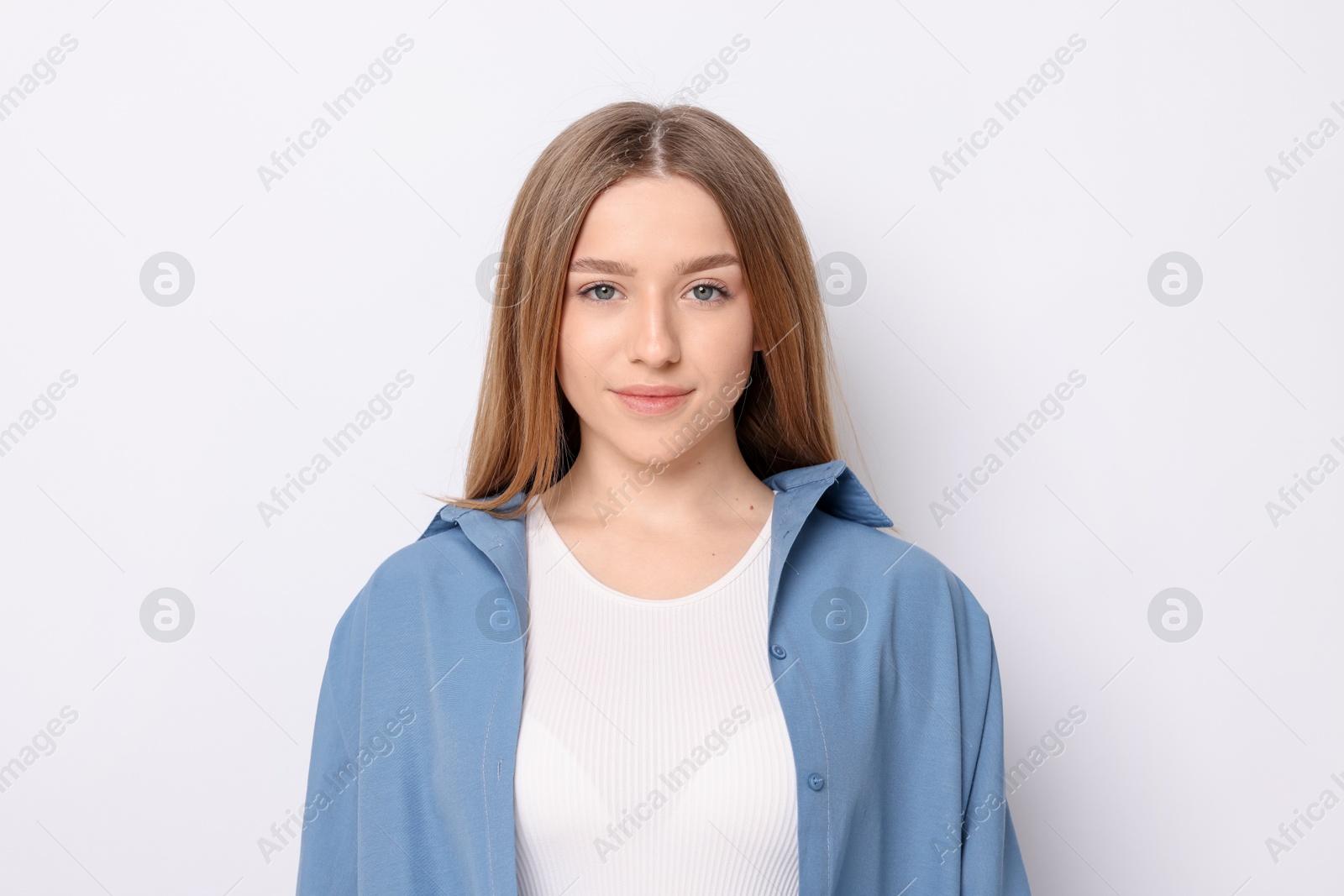 Portrait of teenage girl on white background Photo of Portrait of teenage girl on white background