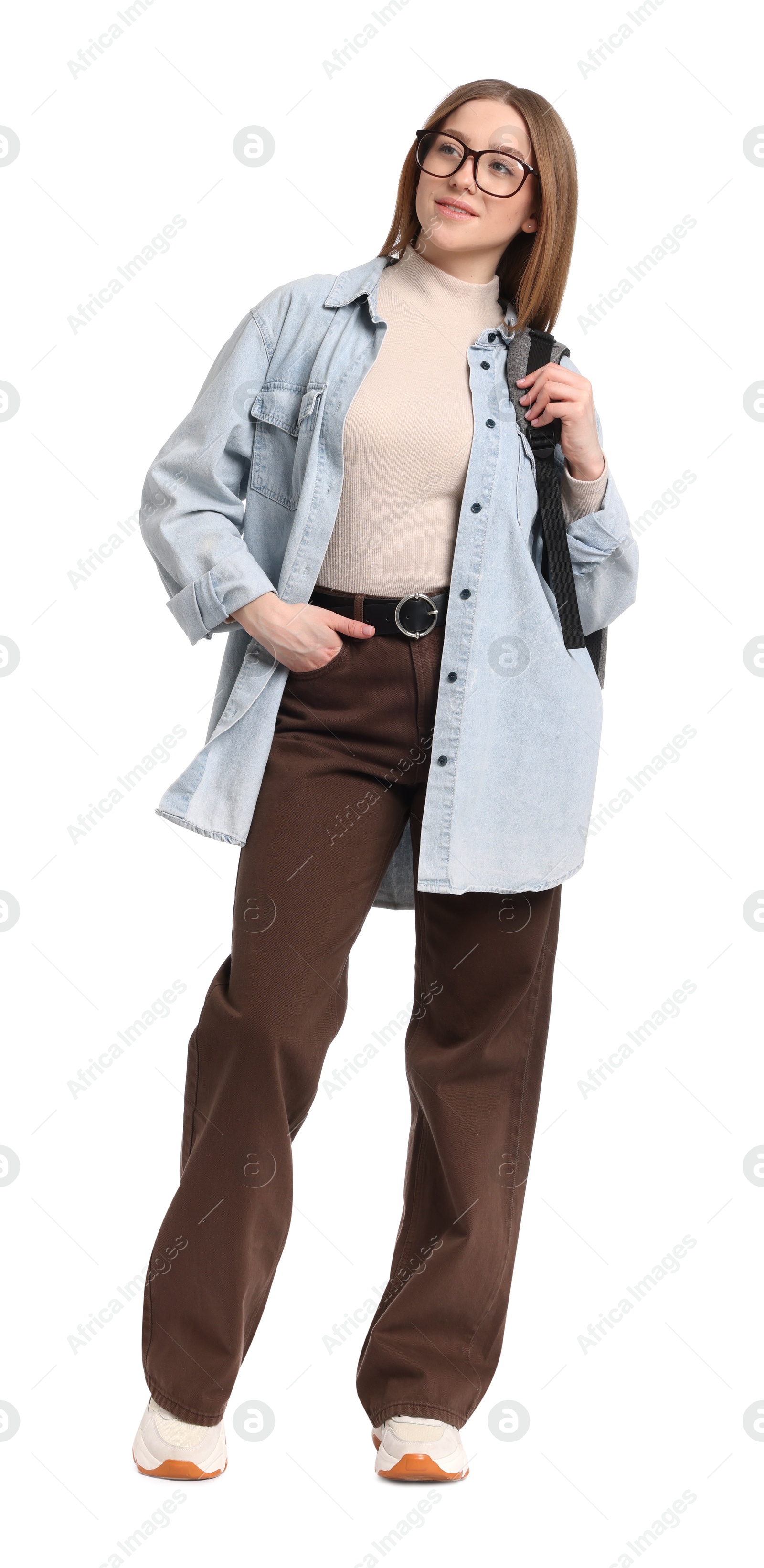 Photo of Smiling teenage girl with backpack on white background