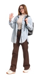 Photo of Smiling teenage girl with backpack on white background