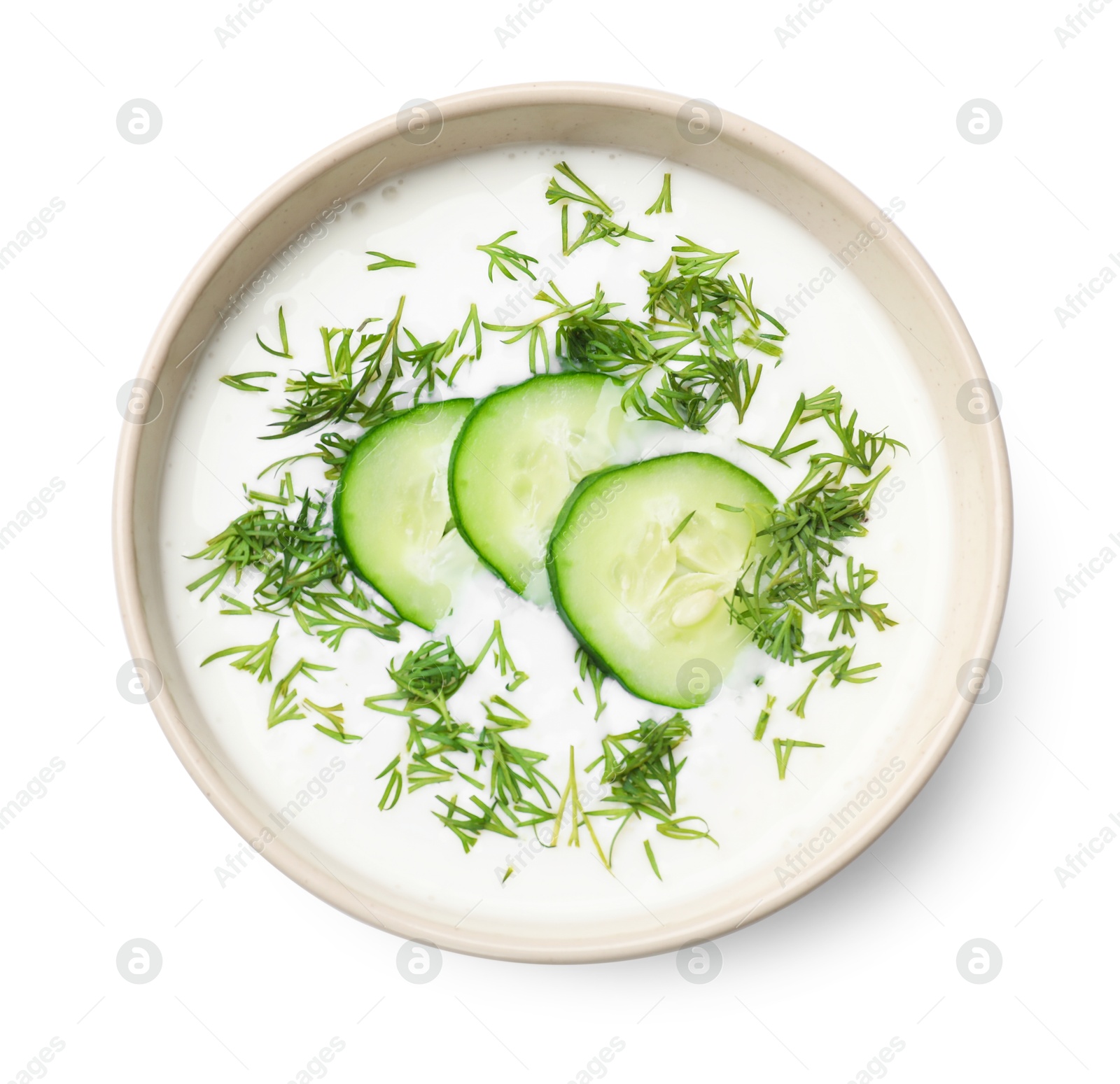 Tasty cucumber soup with dill in bowl isolated on white, top view Photo of Tasty cucumber soup with dill in bowl isolated on white, top view