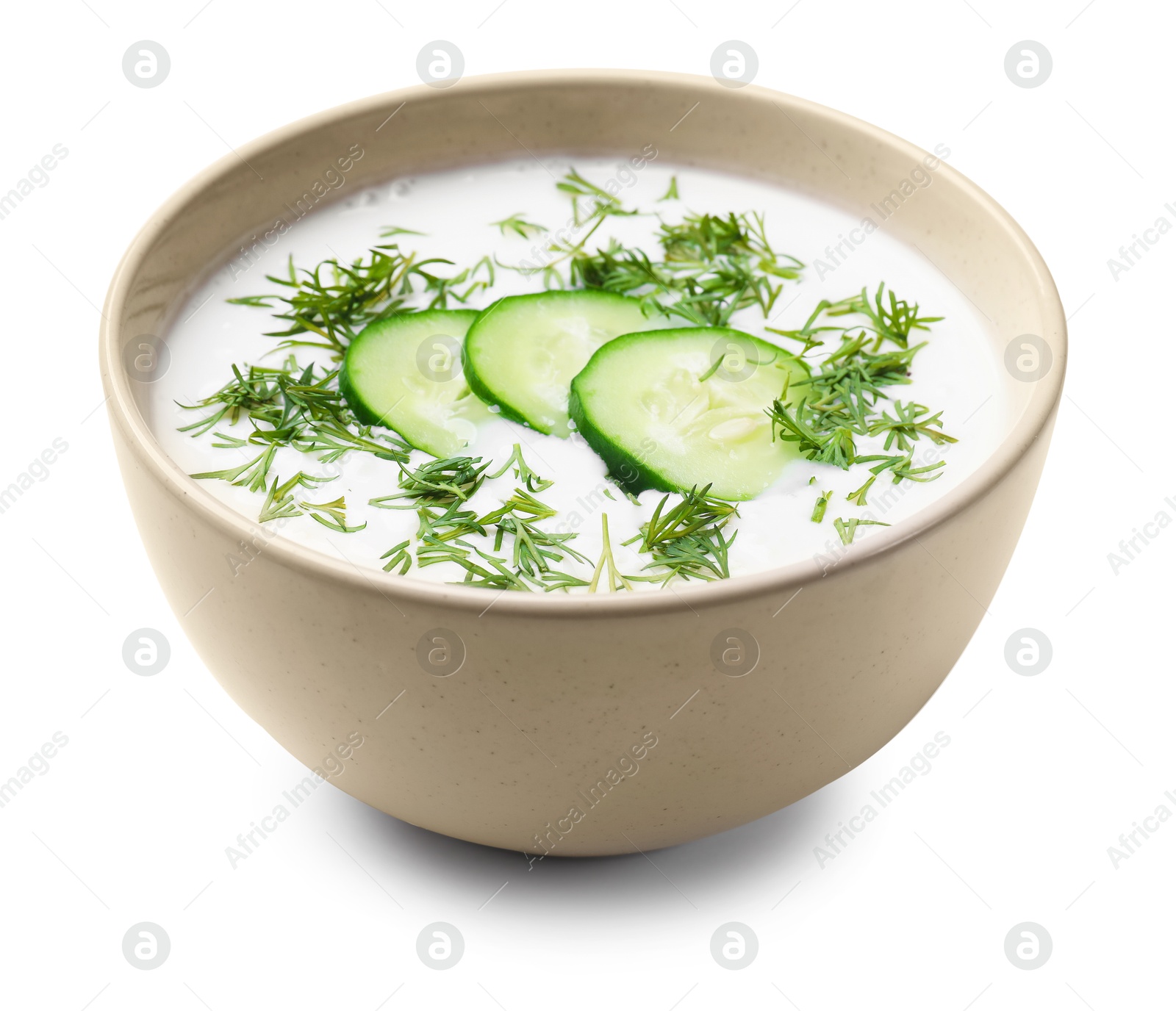 Tasty cucumber soup with dill in bowl isolated on white Photo of Tasty cucumber soup with dill in bowl isolated on white