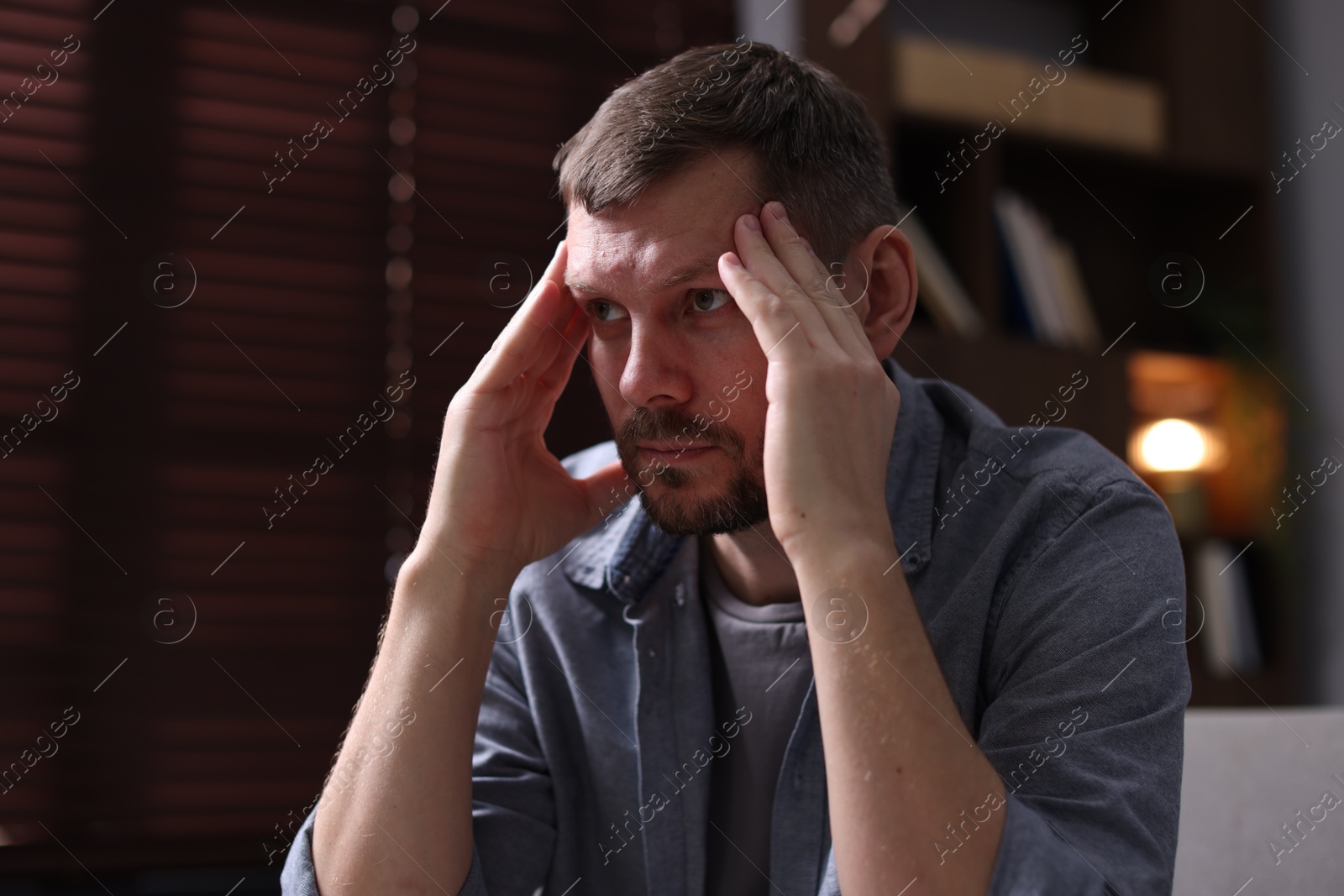 Depressed man at home. Mental health problem Photo of Depressed man at home. Mental health problem