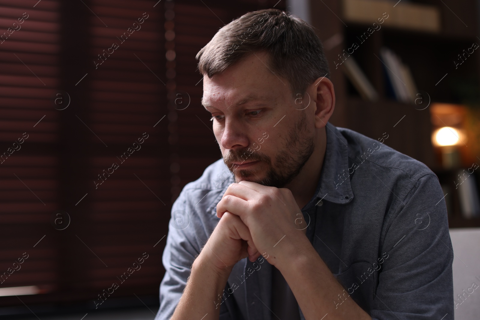 Depressed man at home. Mental health problem Photo of Depressed man at home. Mental health problem