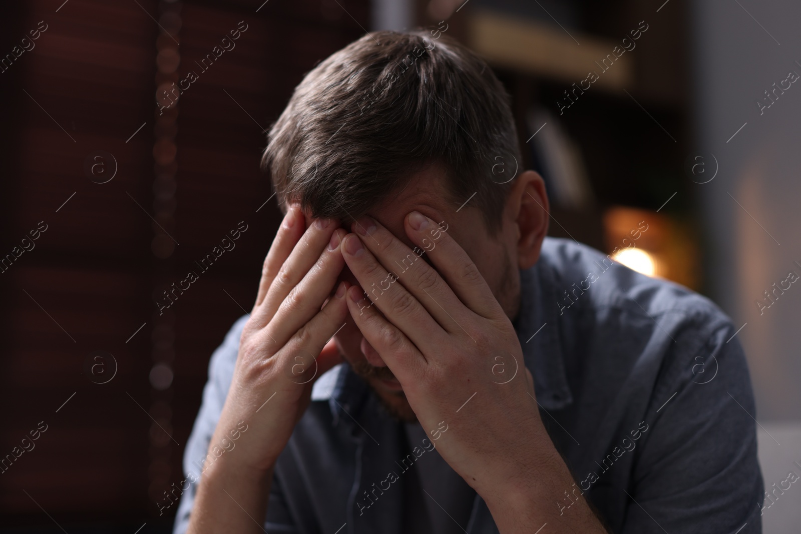 Depressed man at home. Mental health problem Photo of Depressed man at home. Mental health problem