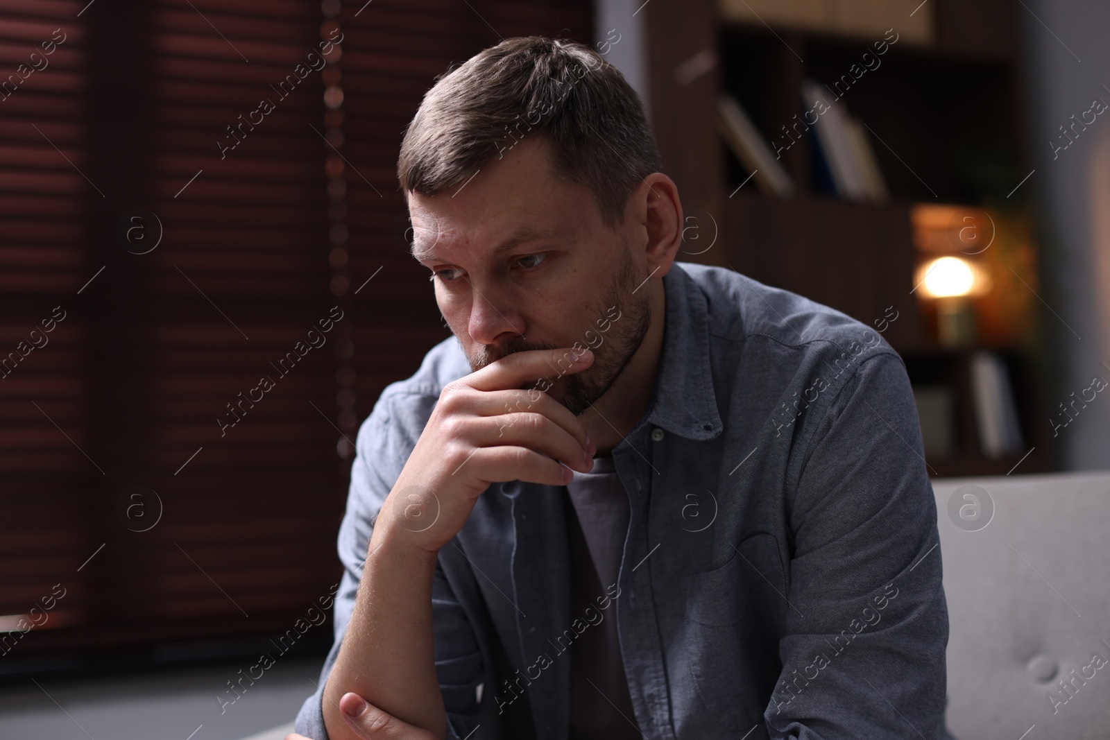 Depressed man at home. Mental health problem Photo of Depressed man at home. Mental health problem