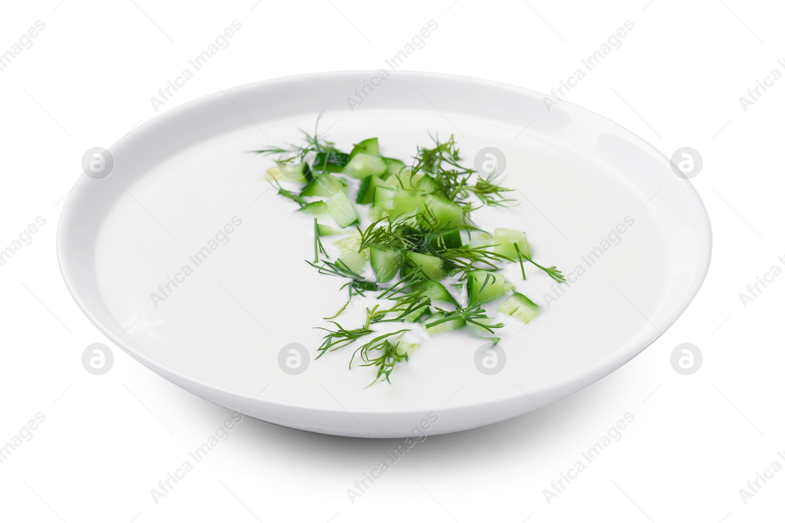 Tasty cucumber soup with dill in bowl isolated on white Photo of Tasty cucumber soup with dill in bowl isolated on white