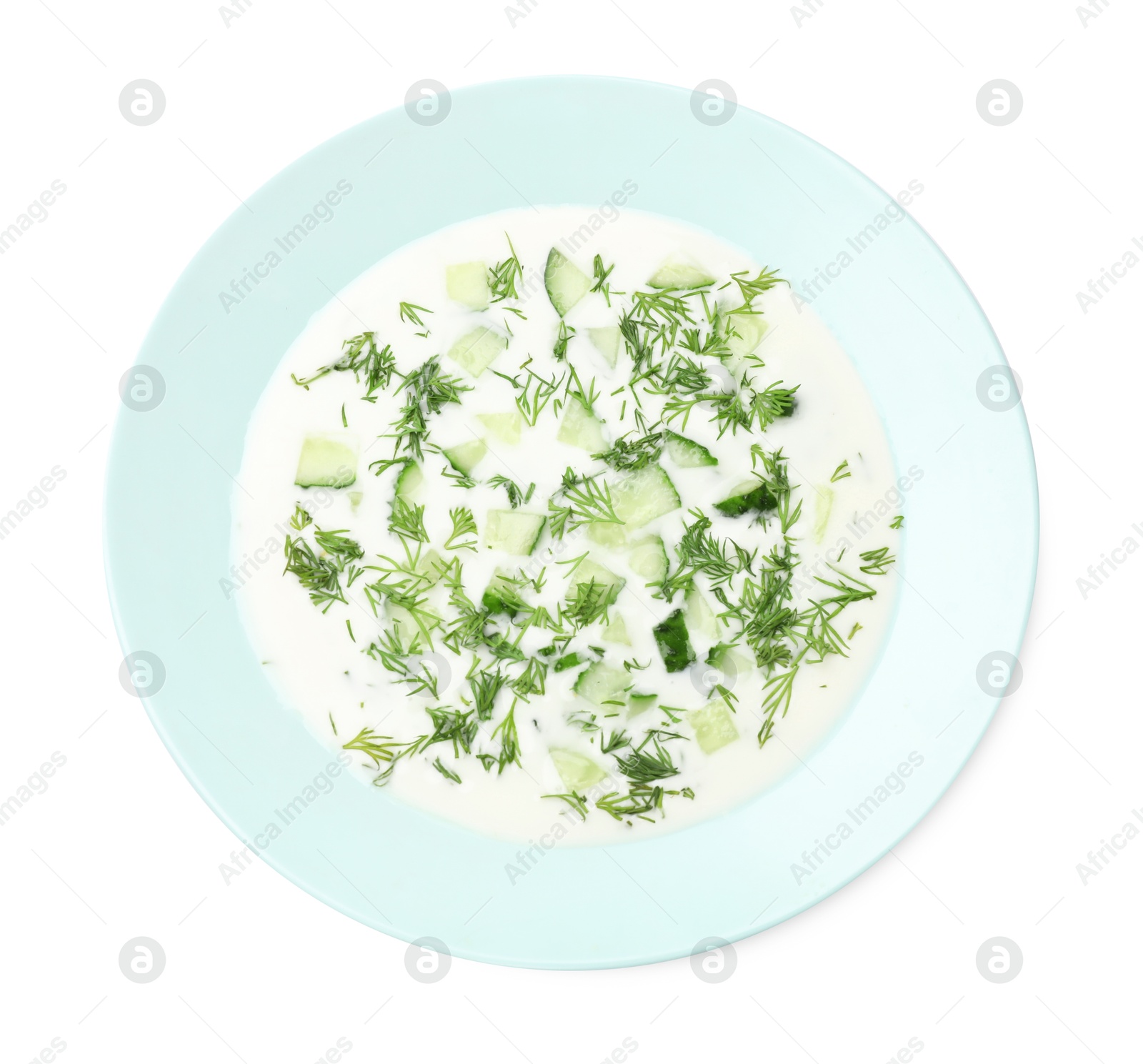 Tasty cucumber soup with dill isolated on white, top view Photo of Tasty cucumber soup with dill isolated on white, top view