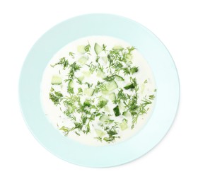 Photo of Tasty cucumber soup with dill isolated on white, top view