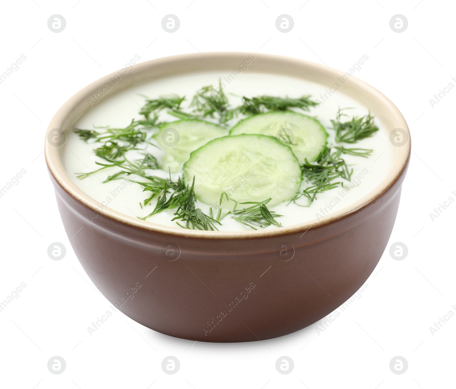 Tasty cucumber soup with dill in bowl isolated on white Photo of Tasty cucumber soup with dill in bowl isolated on white