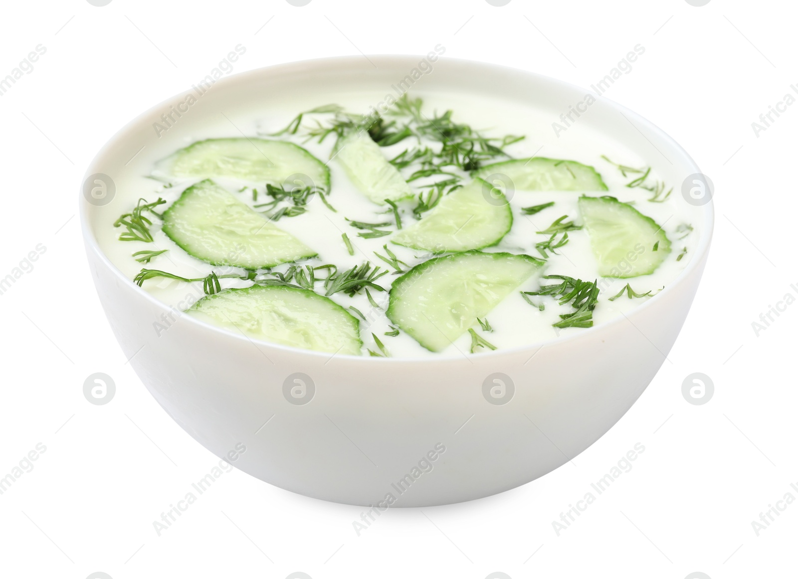 Tasty cucumber soup with dill in bowl isolated on white Photo of Tasty cucumber soup with dill in bowl isolated on white