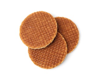 Photo of Tasty round waffles isolated on white, top view
