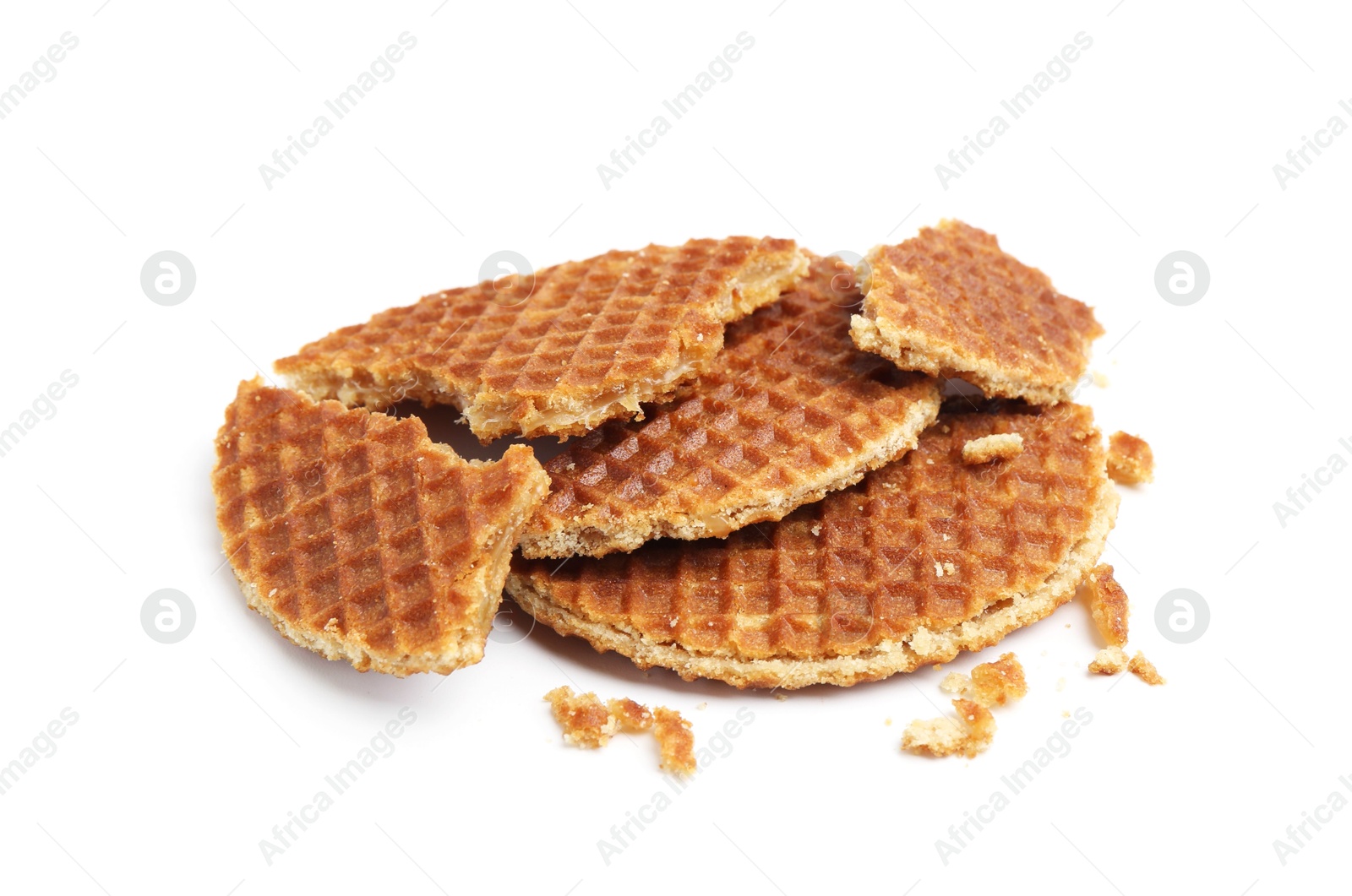 Pieces of tasty round waffles isolated on white Photo of Pieces of tasty round waffles isolated on white