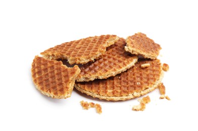 Photo of Pieces of tasty round waffles isolated on white