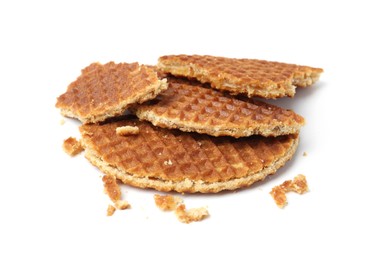 Photo of Pieces of tasty round waffles isolated on white