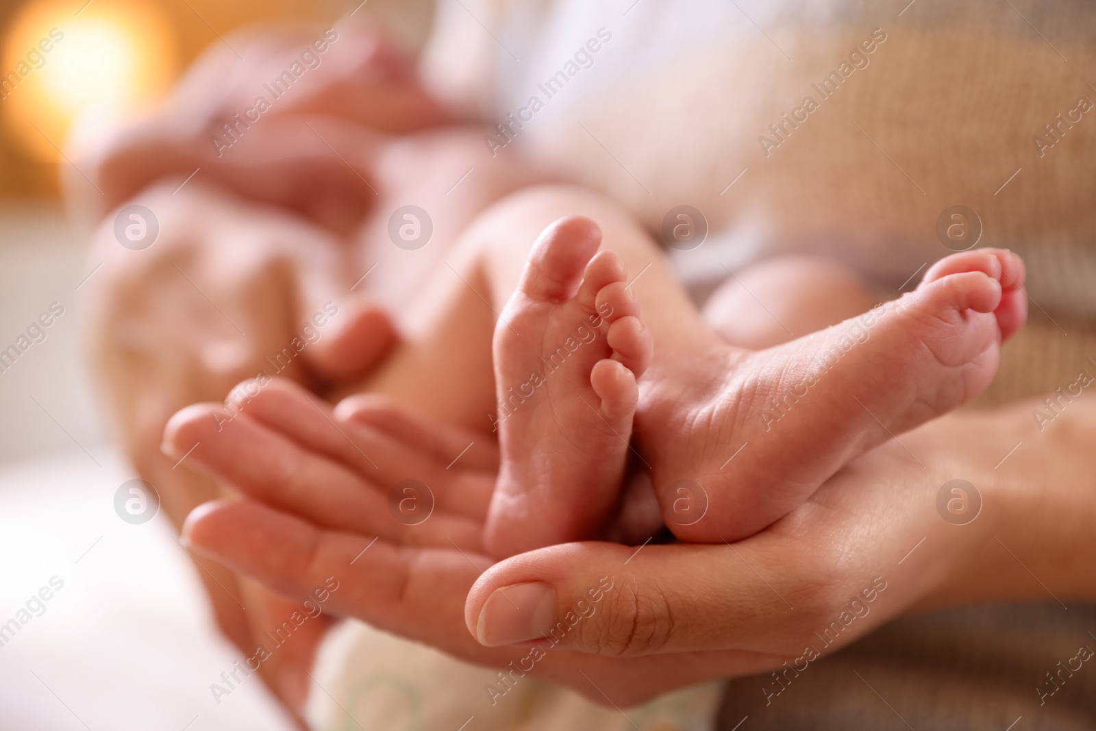 Mother with her little baby indoors, closeup Photo of Mother with her little baby indoors, closeup