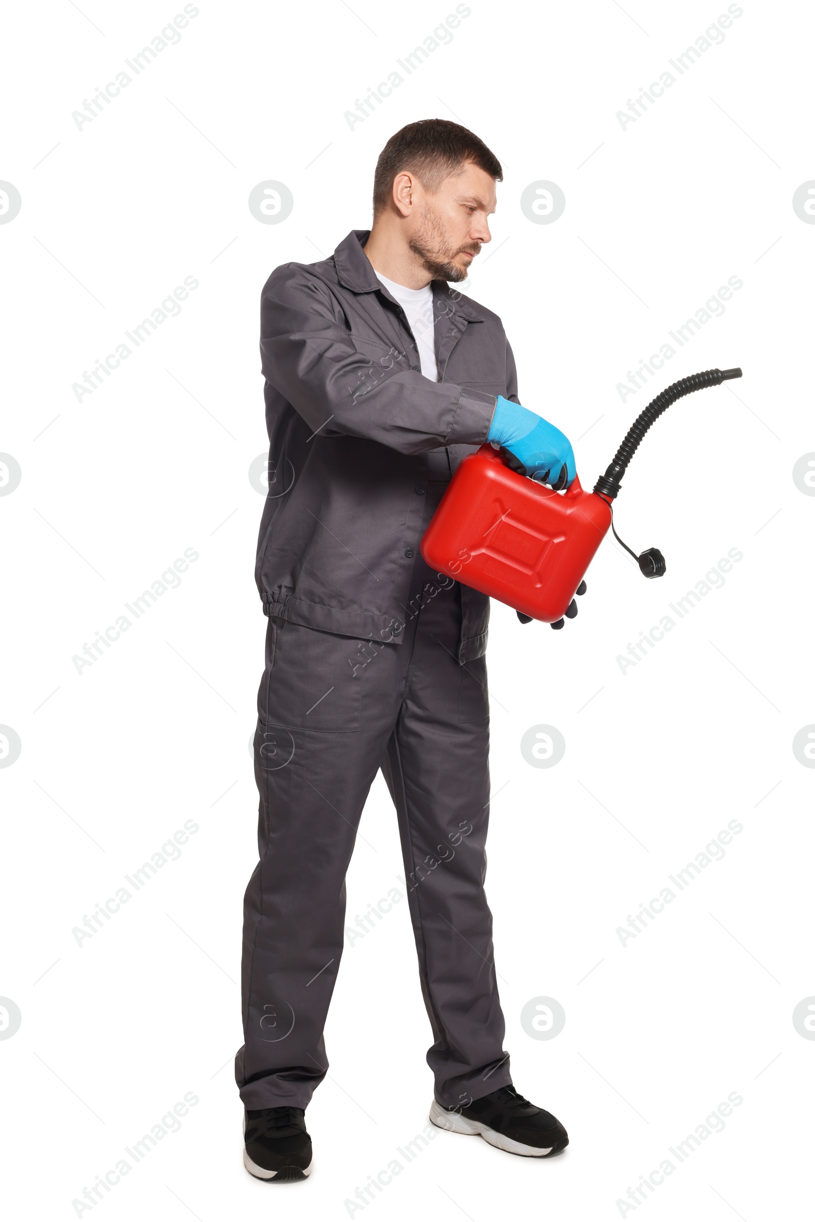 Man holding plastic canister on white background Photo of Man holding plastic canister on white background