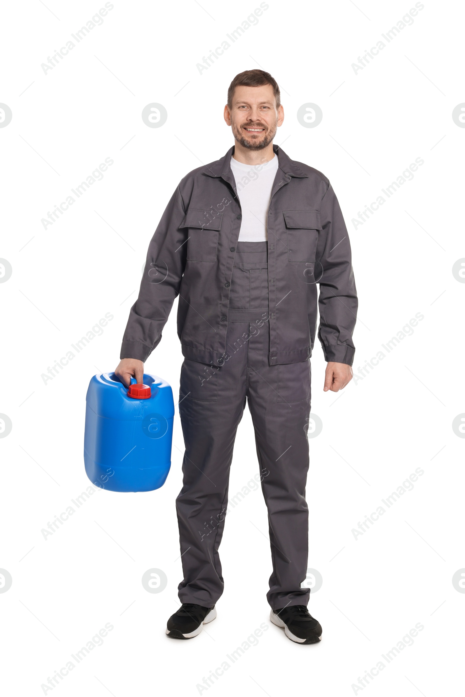 Man holding plastic canister on white background Photo of Man holding plastic canister on white background