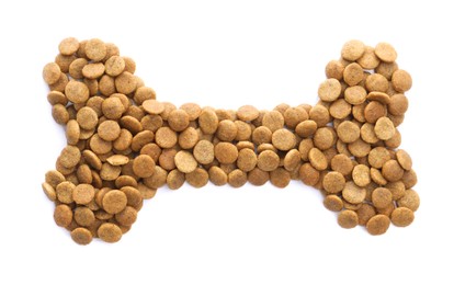 Photo of Bone shape made of dry pet food isolated on white, top view