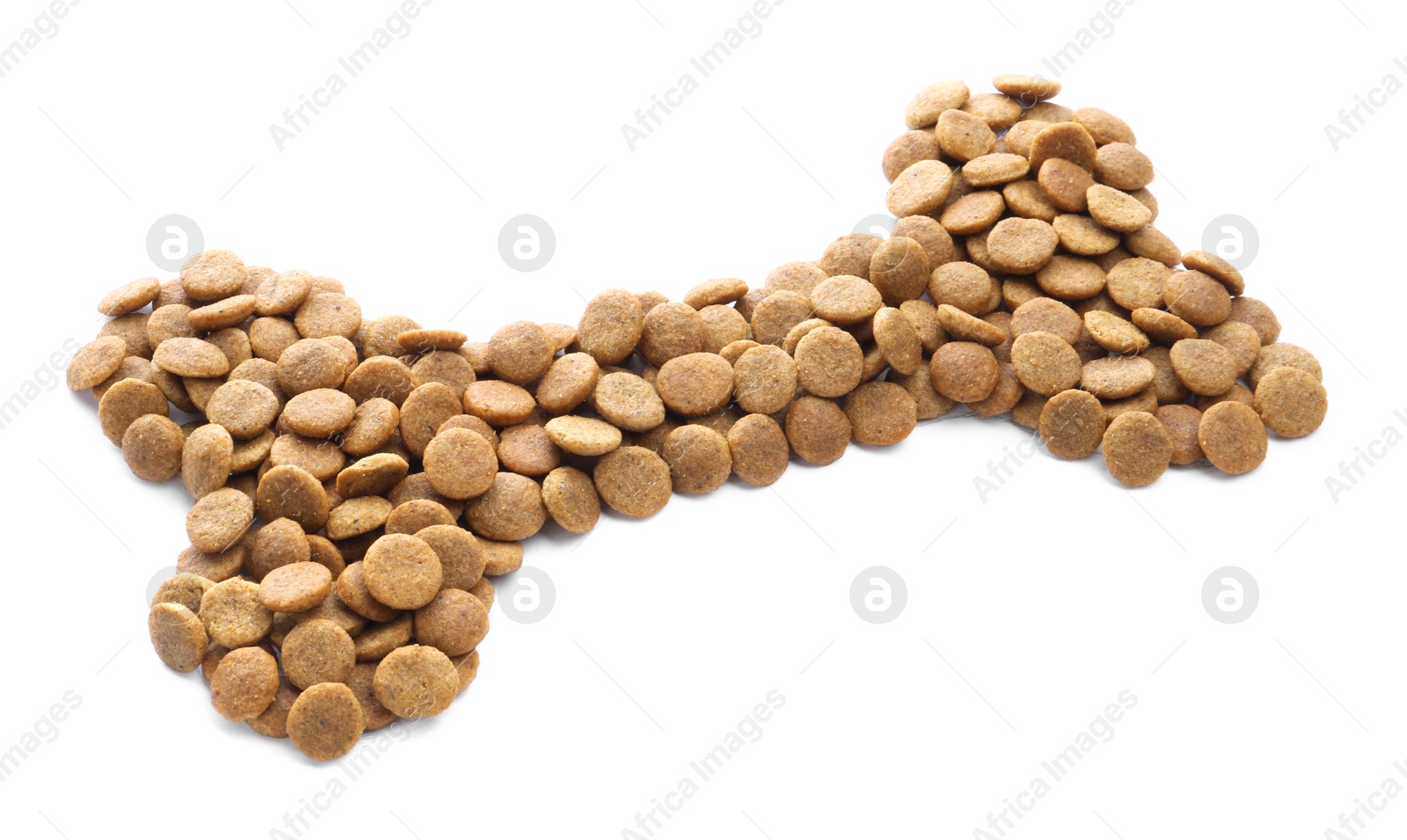 Bone shape made of dry pet food isolated on white Photo of Bone shape made of dry pet food isolated on white
