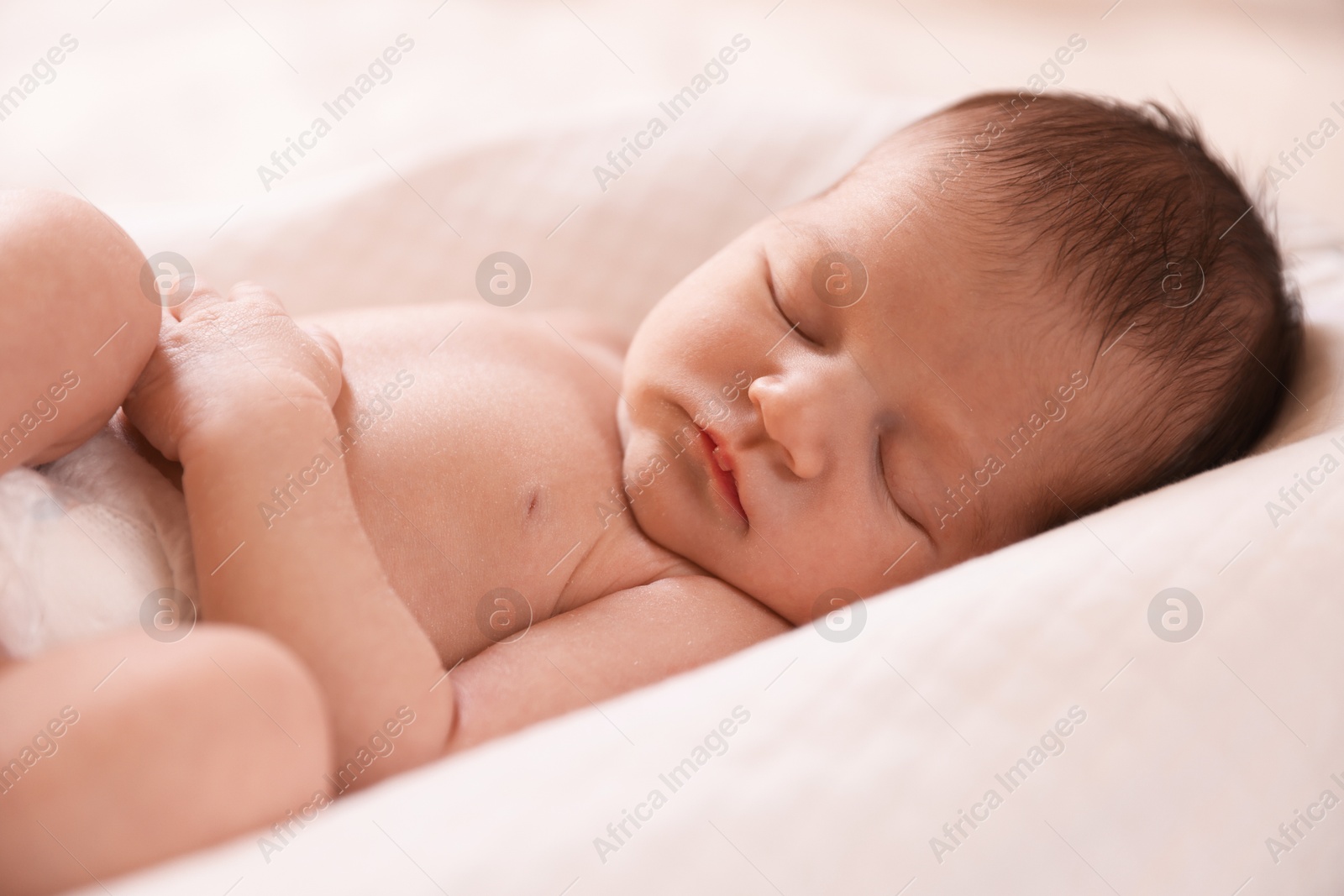 Photo of Bedtime. Cute little baby sleeping in lounger indoors