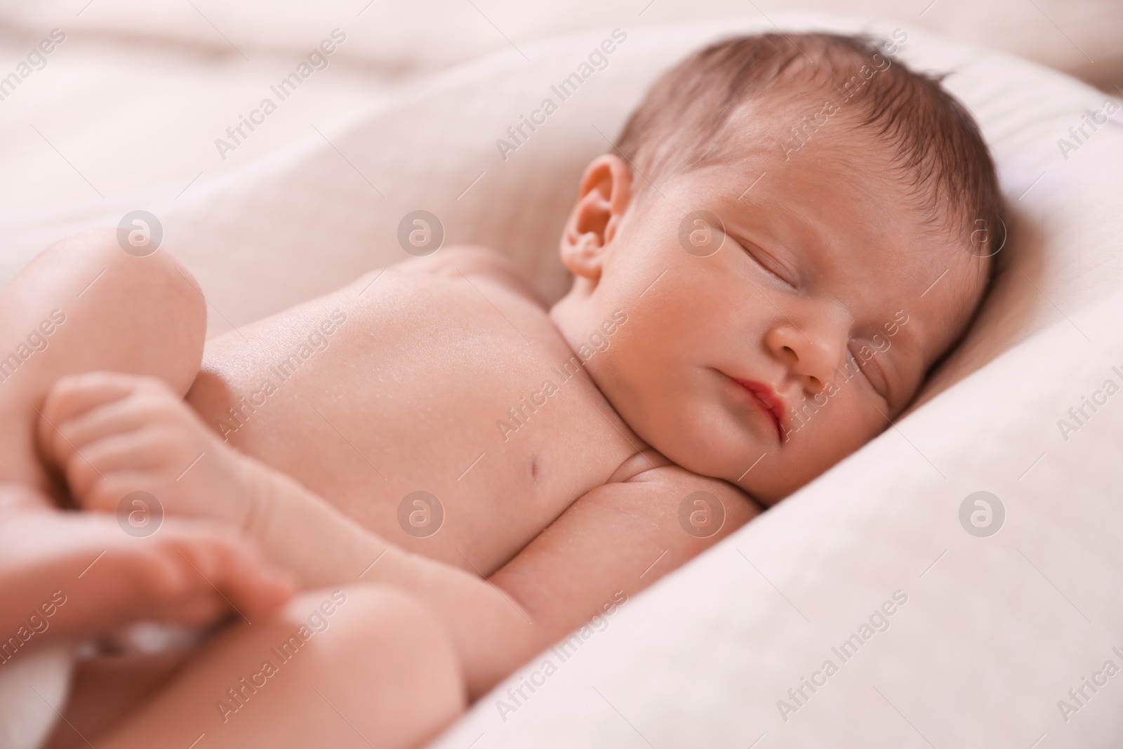 Bedtime. Cute little baby sleeping in lounger indoors Photo of Bedtime. Cute little baby sleeping in lounger indoors