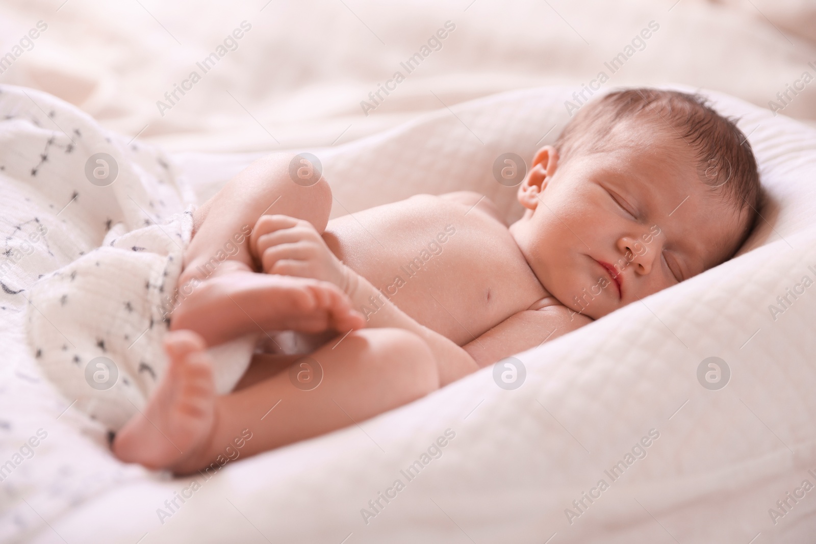 Bedtime. Cute little baby sleeping in lounger indoors Photo of Bedtime. Cute little baby sleeping in lounger indoors