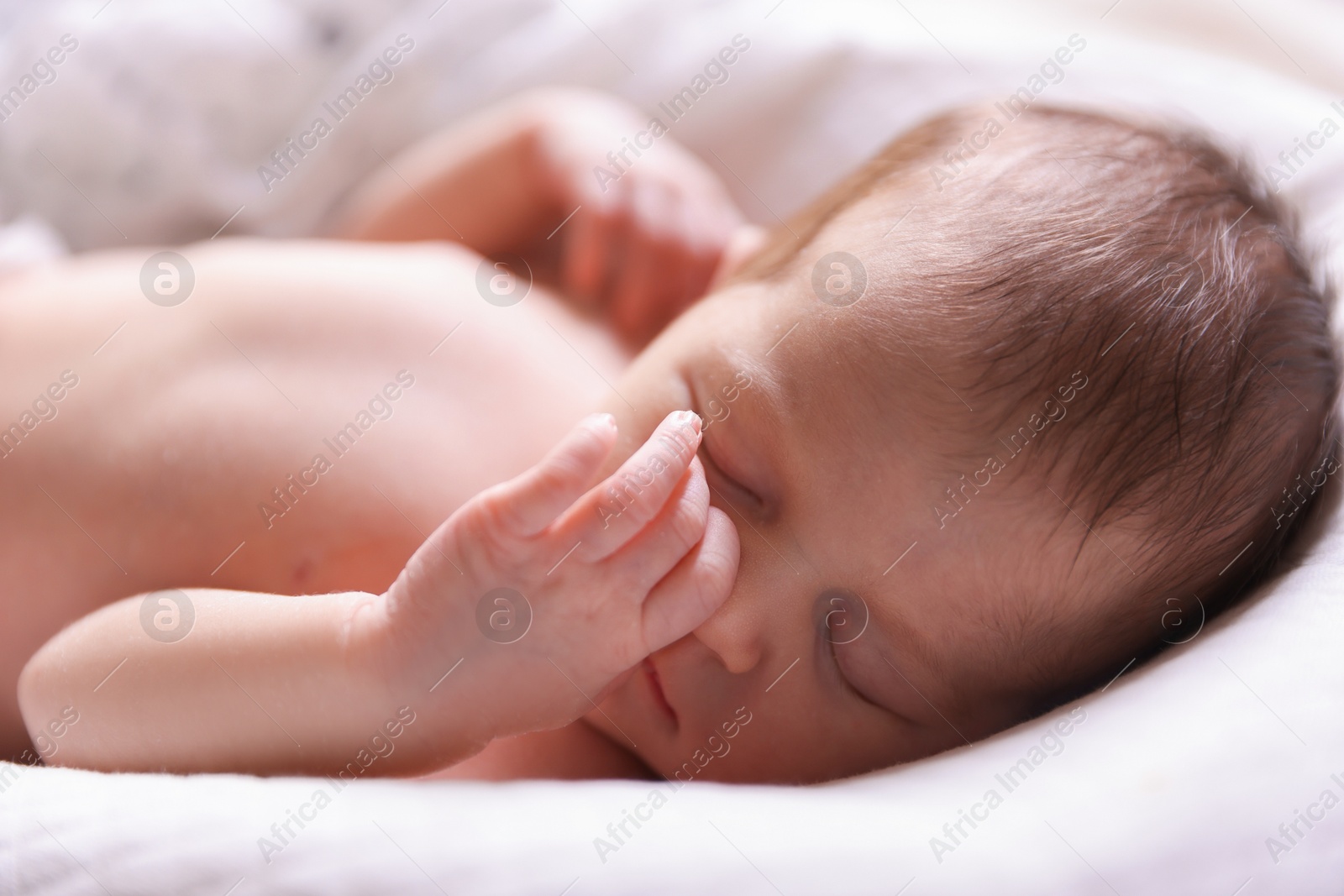 Bedtime. Cute little baby sleeping in lounger indoors Photo of Bedtime. Cute little baby sleeping in lounger indoors