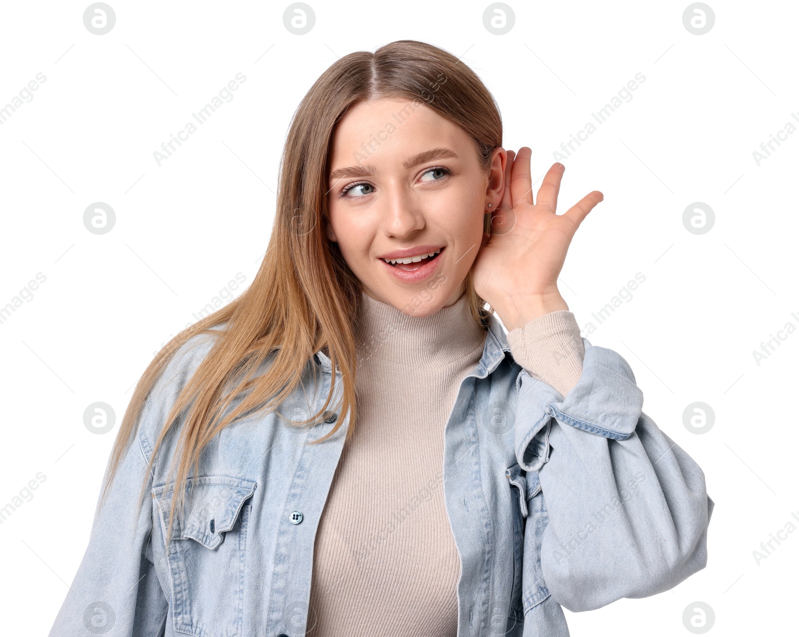 Smiling teenage girl showing hand to ear gesture on white background Photo of Smiling teenage girl showing hand to ear gesture on white background