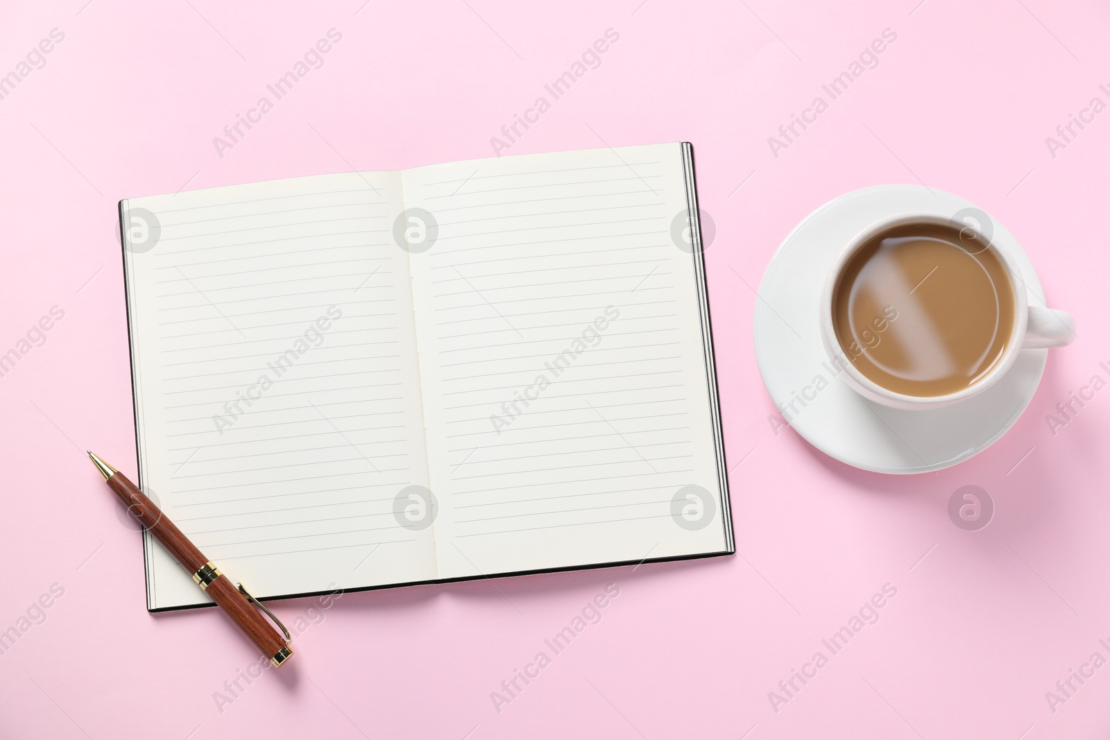 Open blank notebook, pen and coffee on pink background, flat lay Photo of Open blank notebook, pen and coffee on pink background, flat lay