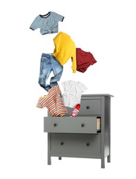 Image of Clothes flying out of dresser on white background